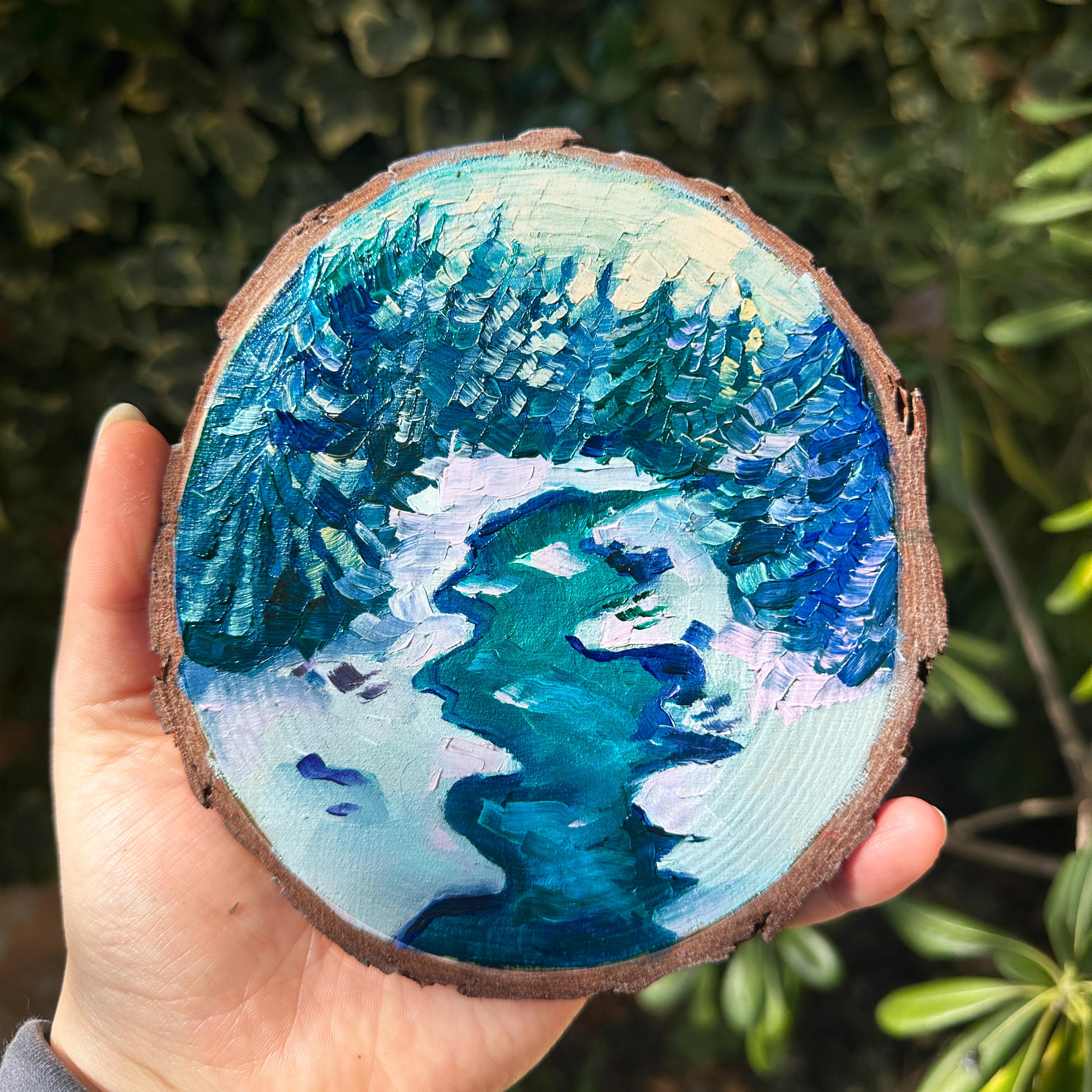 Winter Pines Serenity – Hand-Painted Snowy River on Wood Slice Unique Christmas Gift Landscape Art Nature Inspired Home Decor Wall